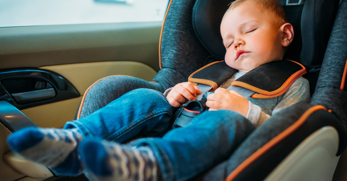 baby in car seat with nanny