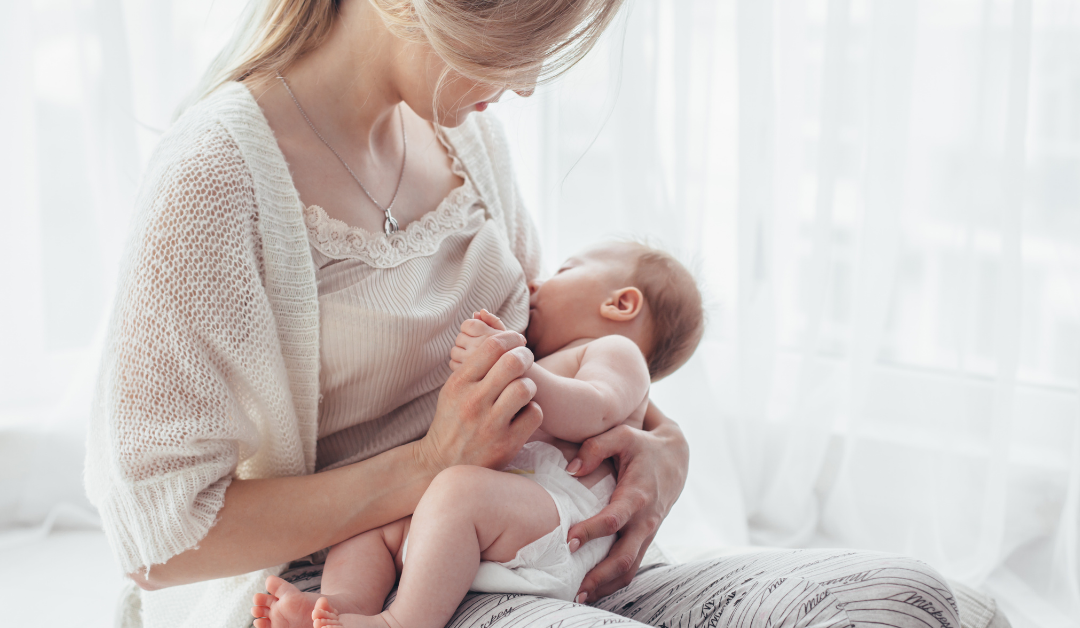 mother breastfeeding a newborn